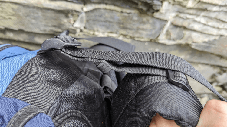 A load-lifting strap on a high-capacity rucksack.