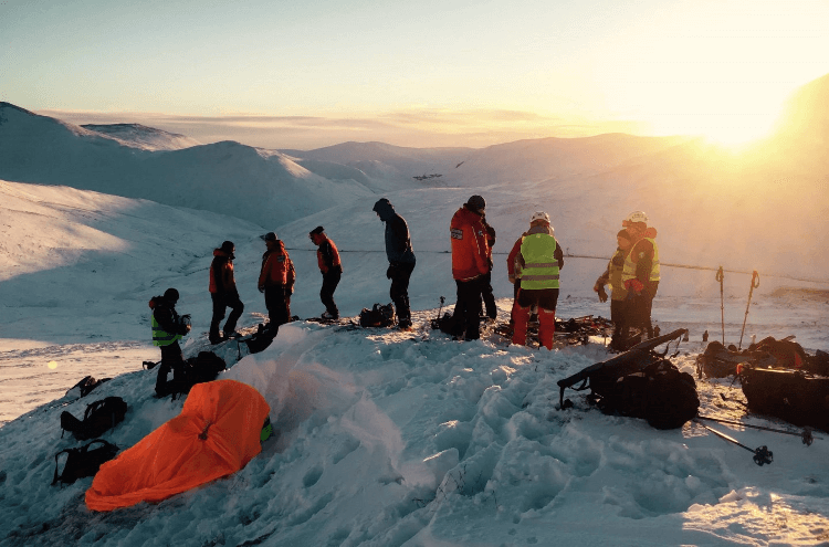 Mountain Rescue out atop snowy peaks