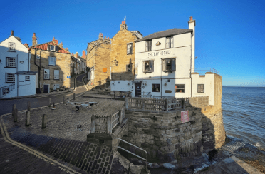 The Bay Hotel sits in Robin Hood's Bay by the descent to the water.